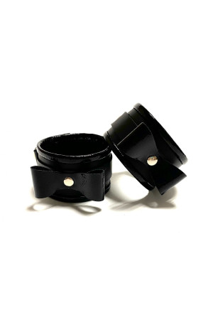 Черные наручники с бантиками из эко-кожи